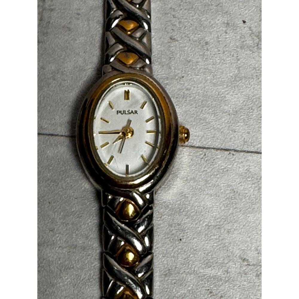 Pulsar Women V811-X043 White Dial Two-Tone Band 17mm Oval Quartz Watch